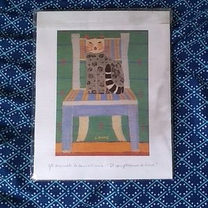"cat in chair" by L. Fiume